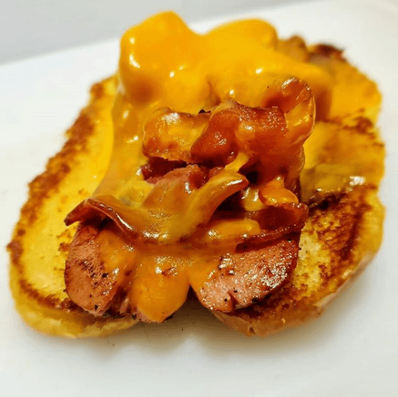 Hot Pig Dog - gourmet hot dog with pulled pork and cheese