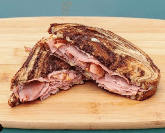 Marble rye grilled cheese with Swiss cheese on fresh baked rye bread