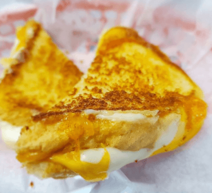 Three Cheese grilled cheese with cheddar, mozzarella, and American cheese blend